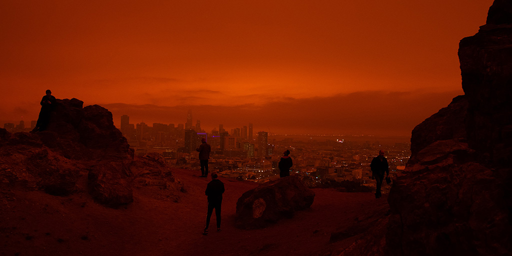 Dystopian vision of a red sky and a city skyline